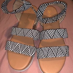 Black and white sandals